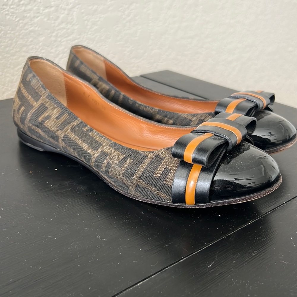 Women’s Authentic Fendi Zucca print flats.